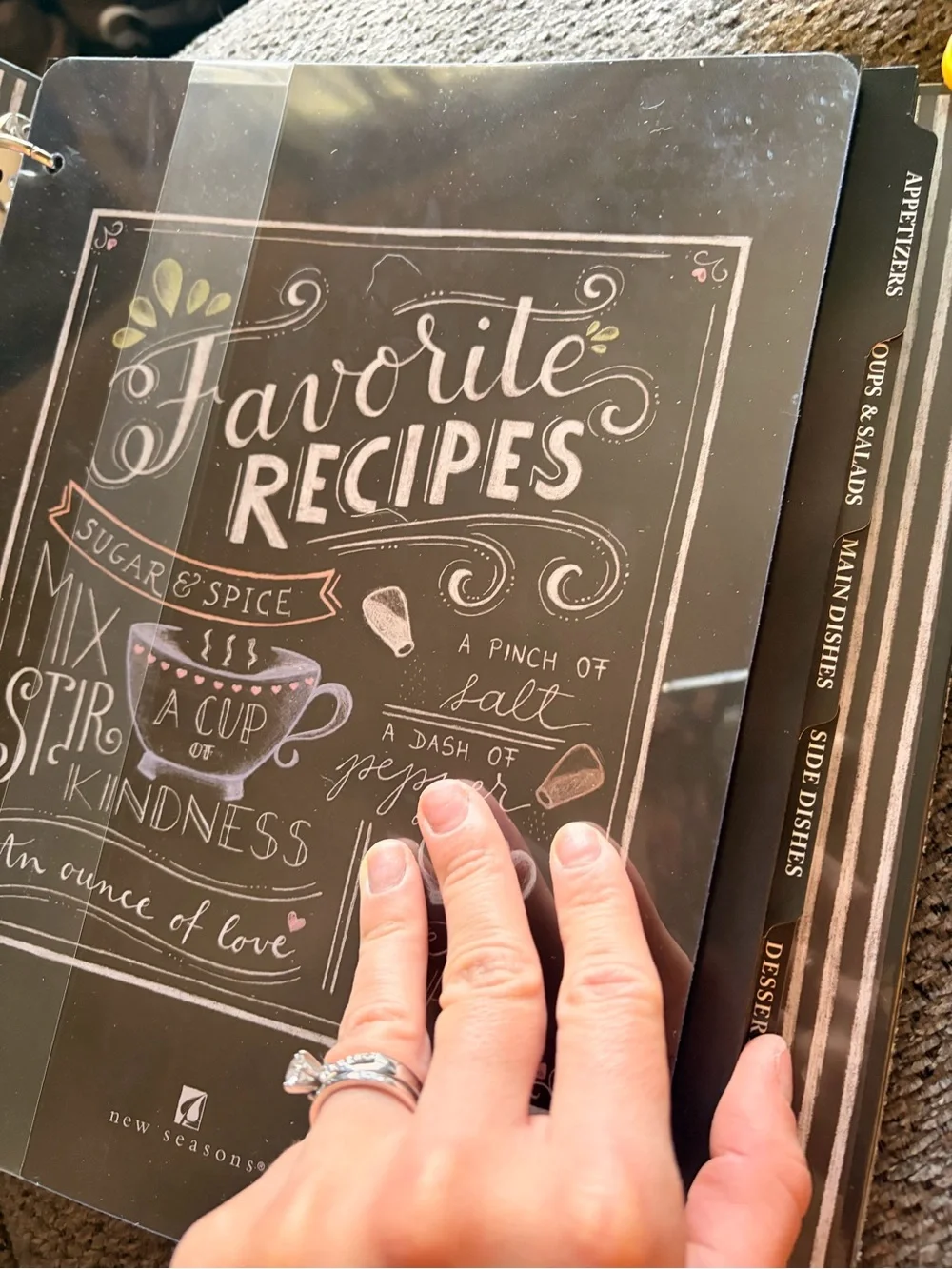 Black 'Recipes' book with divers